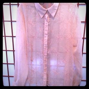 Sheer peach blouse with embroidered floral design